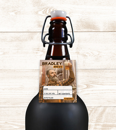 "Bradley Brews" beer growler with a personalized ElastiTag label, featuring a man holding a beer and fields for handwritten details.