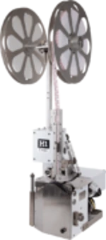 Bedford H1 high speed bag closure machine with two round reels of bag closure clips.