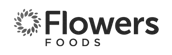 Flowers Foods brand logo with a stylized floral or leaf graphic.