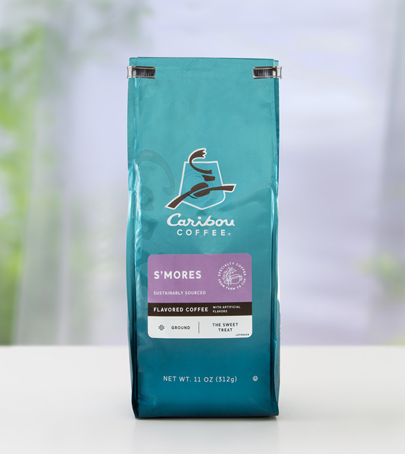 A silver metallic double wire tin tie on a Caribou S'Mores blue coffee bag.