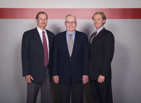 3 men of different generations in suites and ties. 