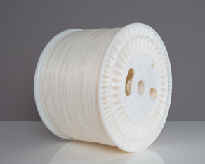 A spool of white wire-free, metal-free face mask nose wire.