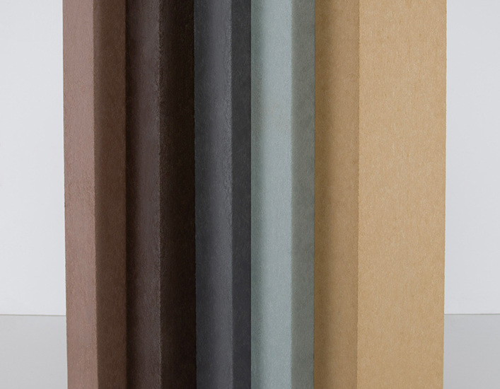 5 recycled plastic lumber boards lined up vertically in various colors. 