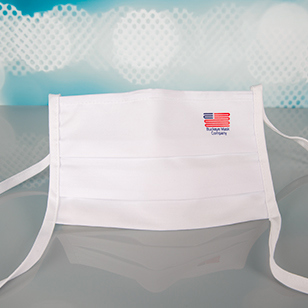 White cloth face mask with American flag embroidered and bendable metal strips nose piece.