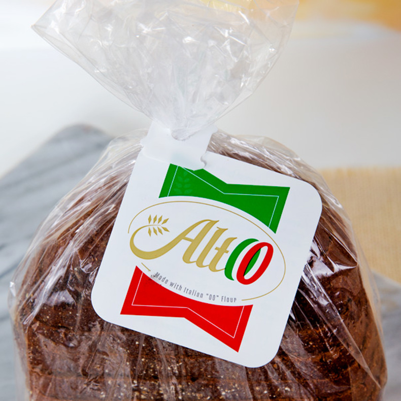 Bread clip with attached flag on Altoo brand bread in green, white, and red.