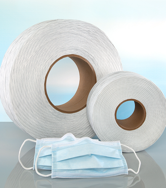 large and small spool of plastic nose tie and two blue disposable face masks with nose bridge strip
